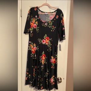 Pretty summer dress. Black with pink& green florals. Perfect for any occasion